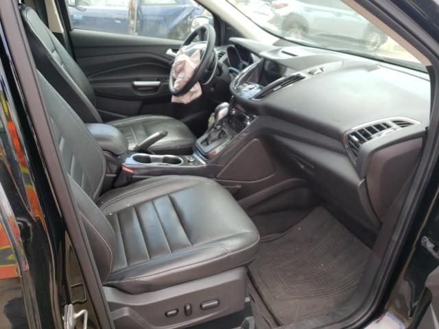 Photo 5 from auction – 2016 FORD ESCAPE TIT with VIN 1FMCU9JX6GUB85560
