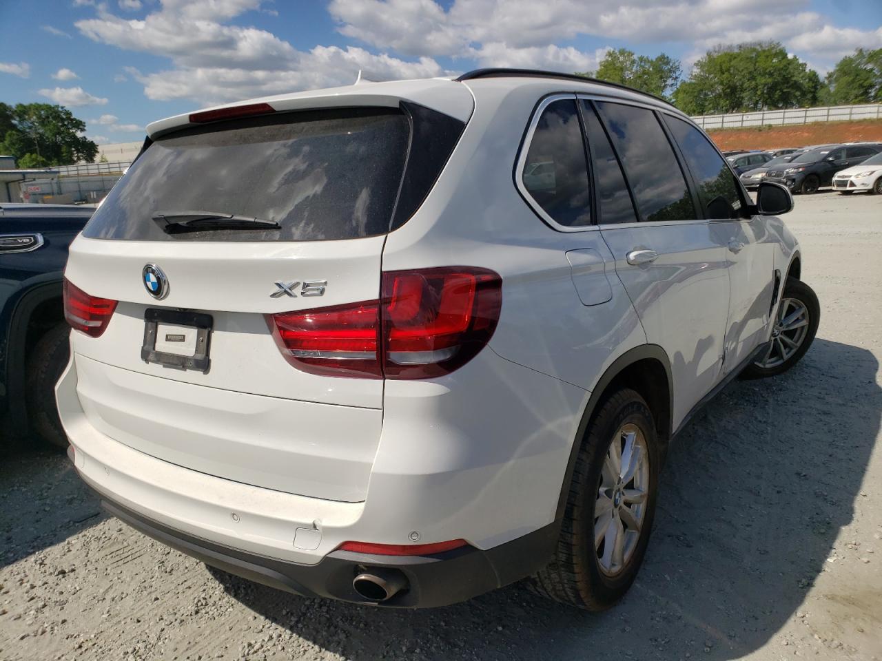 Photo 4 from auction – 2014 BMW X5 XDRIVE3 with VIN 5UXKR0C5XE0K47974