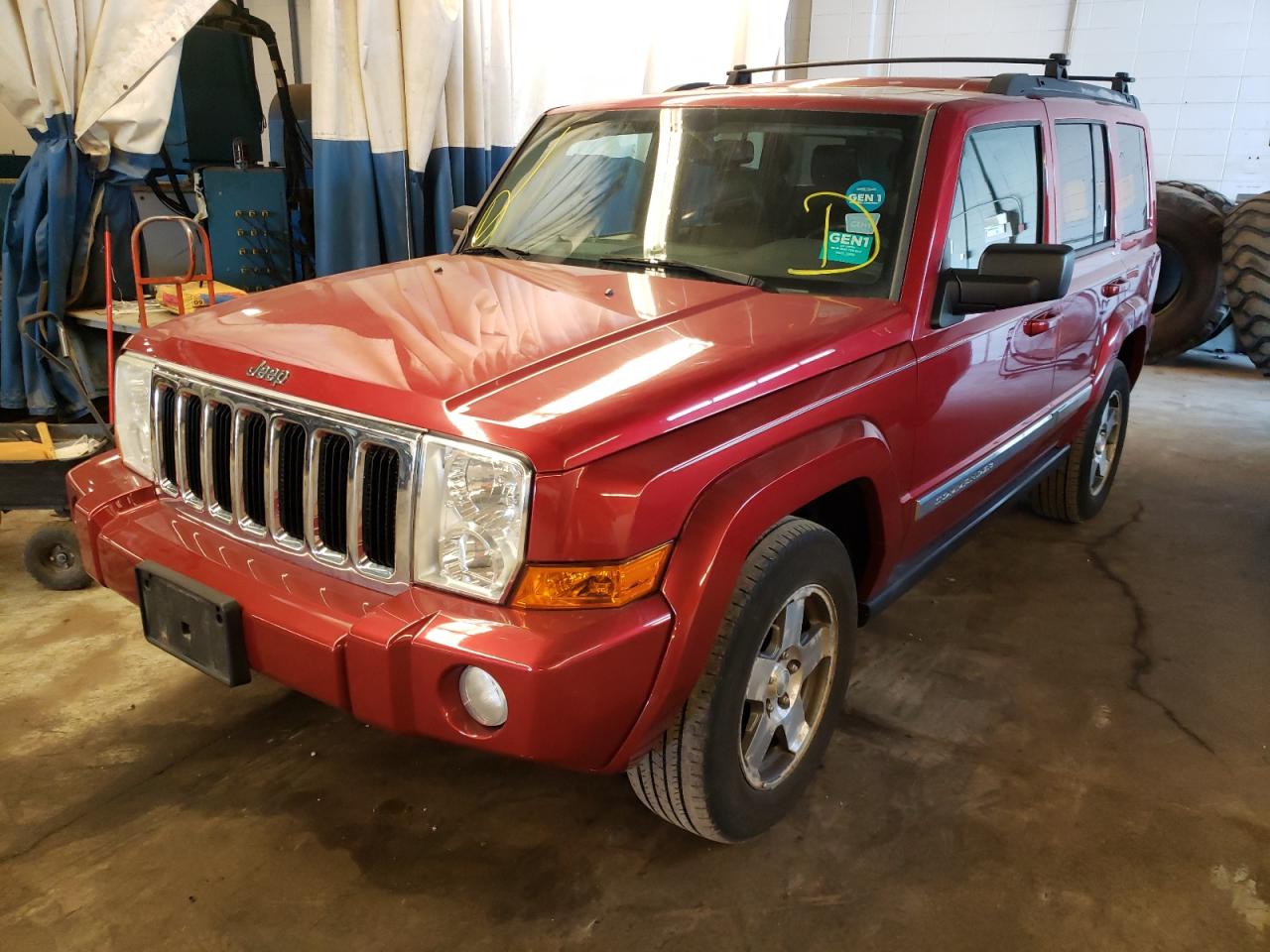 Photo 2 from auction – 2010 JEEP COMMANDER with VIN 1J4RG4GK3AC157002