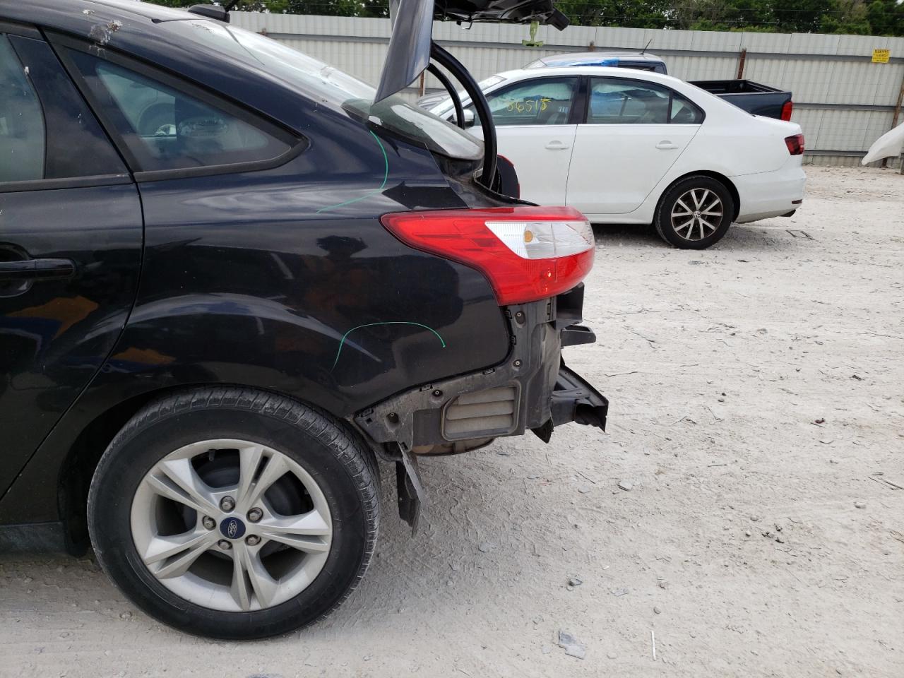 Photo 10 from auction – 2014 FORD FOCUS SE with VIN 1FADP3F21EL117556