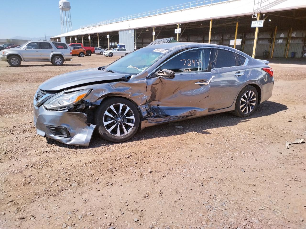 Photo 9 from auction – 2016 NISSAN ALTIMA 2.5 with VIN 1N4AL3AP1GC112037