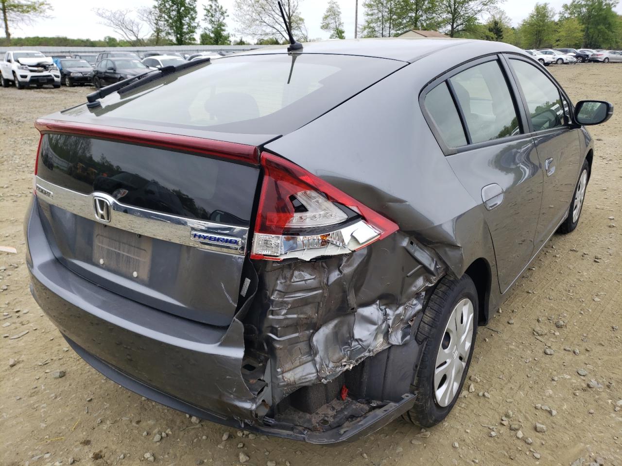 Photo 4 from auction – 2014 HONDA INSIGHT LX with VIN JHMZE2H59ES000707