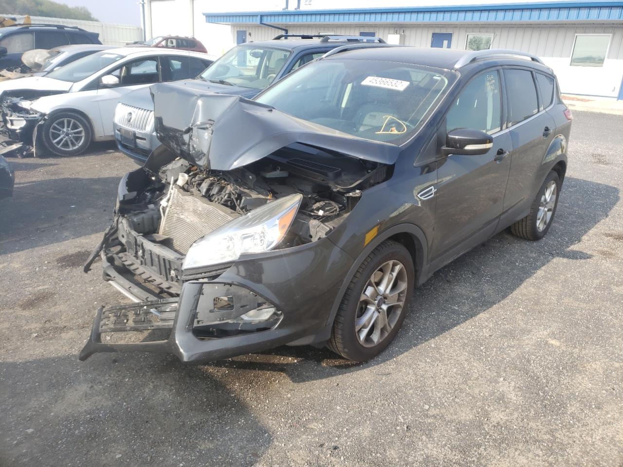 Photo 2 from auction – 2015 FORD ESCAPE TIT with VIN 1FMCU9J96FUA31463