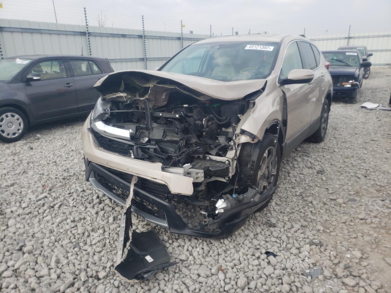 Photo 2 from auction – 2017 HONDA CR-V EXL with VIN 5J6RW2H85HL038601