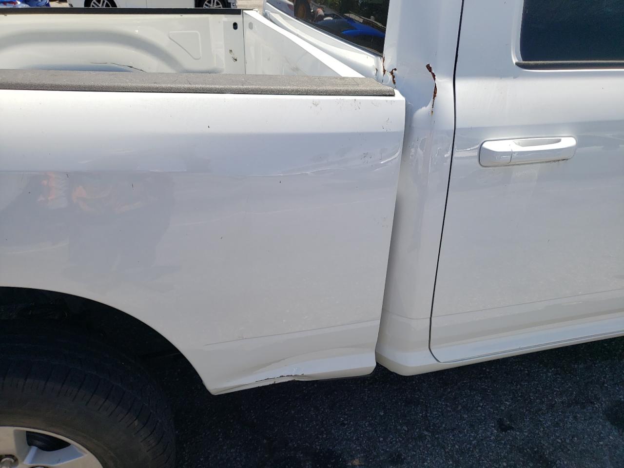 Photo 9 from auction – 2021 RAM 1500 CLASS with VIN 1C6RR6TT2MS520739