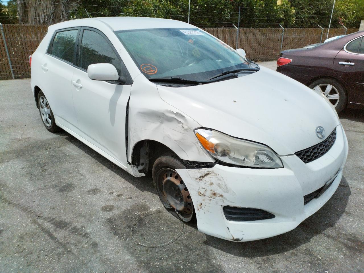 TOYOTA COROLLA MA 2009 with VIN 2T1KU40E19C076202 - Photo from auction