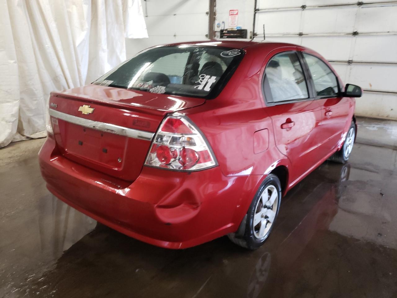 Photo 4 from auction – 2010 CHEVROLET AVEO LS with VIN KL1TD5DE2AB102143