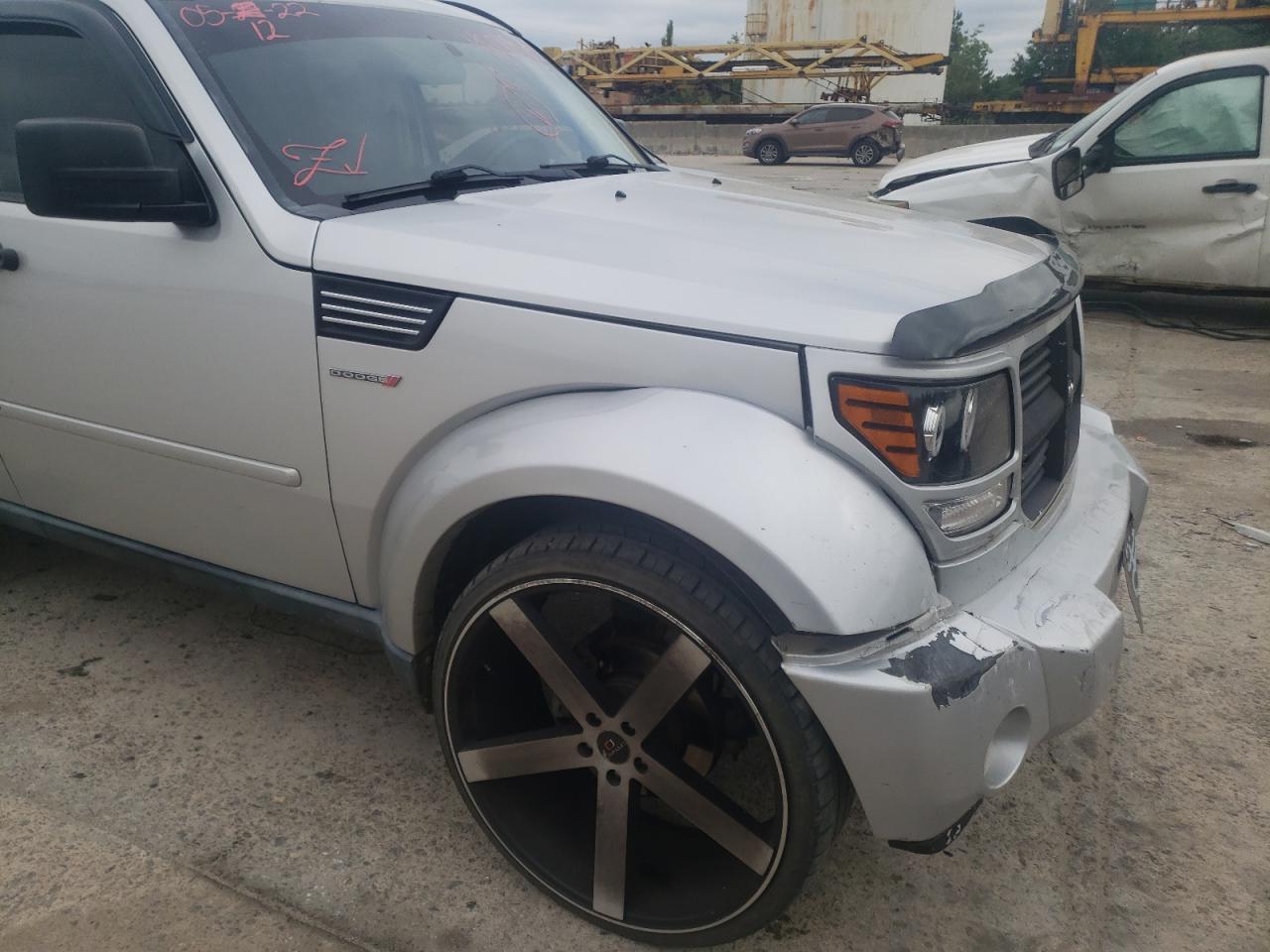 Photo 9 from auction – 2011 DODGE NITRO HEAT with VIN 1D4PT4GKXBW601892