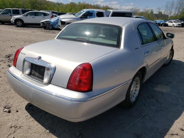 Photo 4 from auction – 2002 LINCOLN TOWN CAR E with VIN 1LNHM81W52Y628984