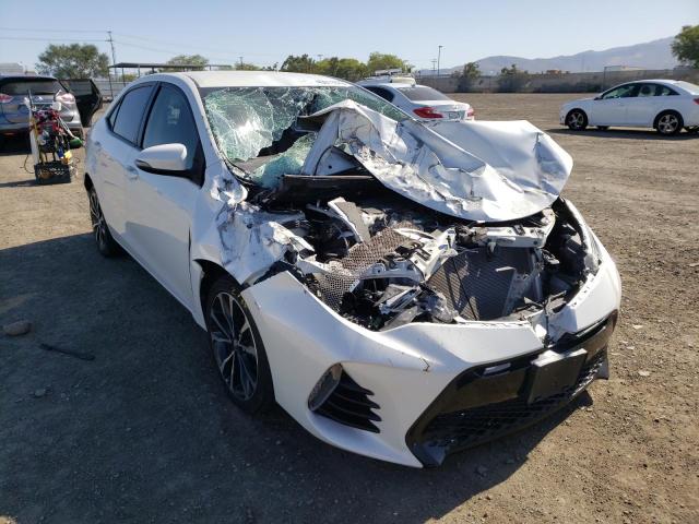 TOYOTA COROLLA L 2017 with VIN 5YFBURHE8HP612725 - Photo from auction