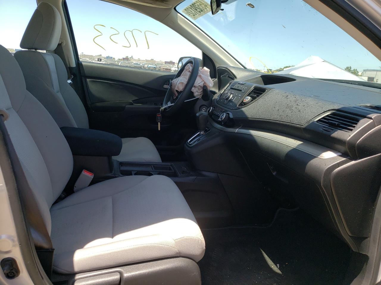 Photo 5 from auction – 2016 HONDA CR-V LX with VIN 2HKRM3H32GH569330