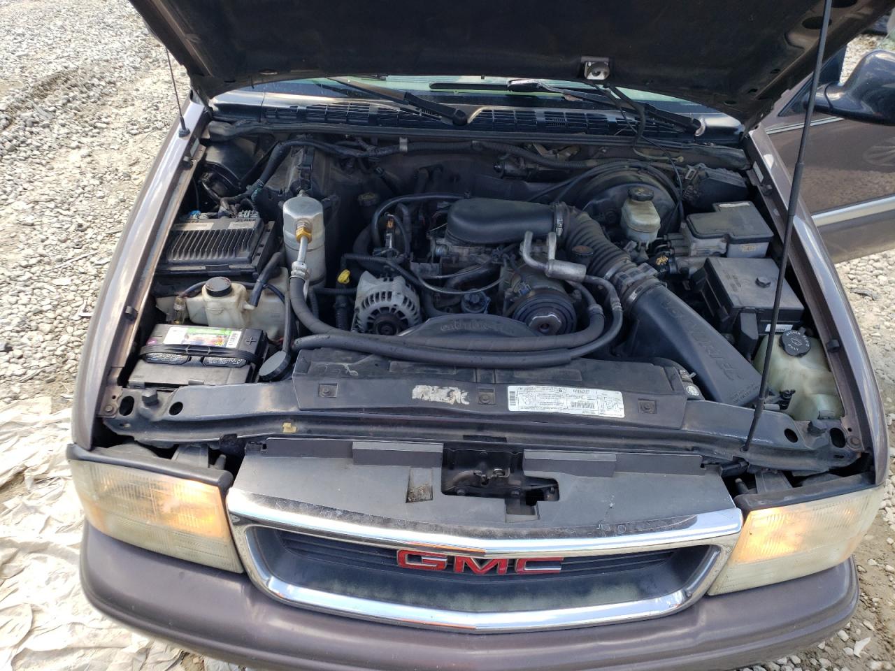 Photo 7 from auction – 1998 GMC JIMMY with VIN 1GKCS13W6W2512747