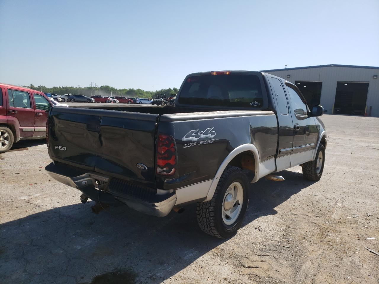 Photo 9 from auction – 2000 FORD F150 with VIN 1FTRX18L8YKA71082