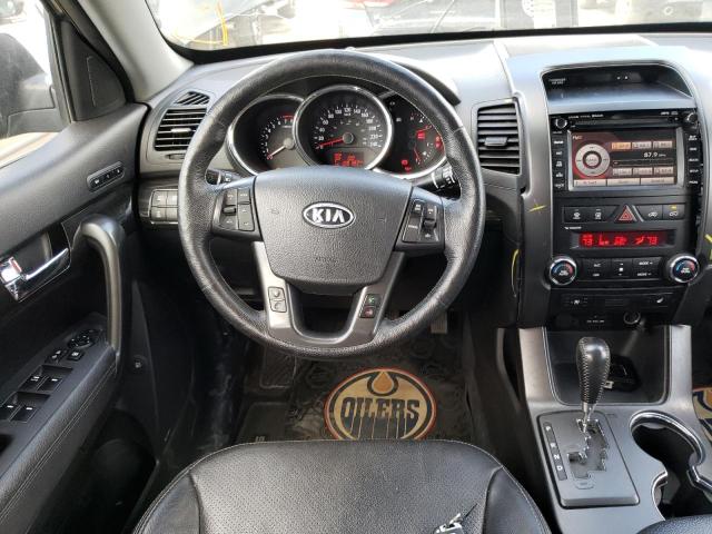 Photo 9 from auction – 2013 KIA SORENTO EX with VIN 5XYKUDA29DG361165