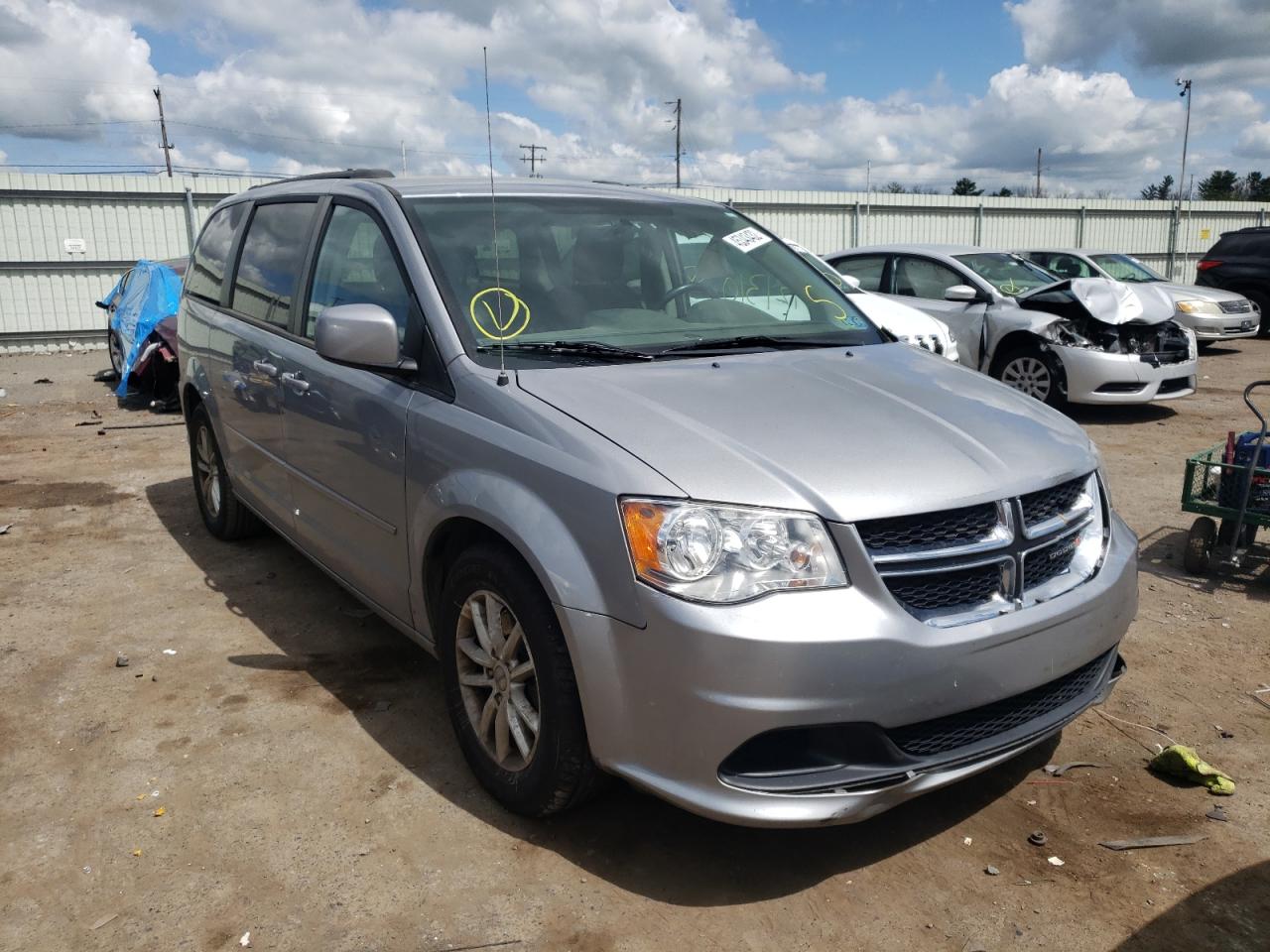 DODGE GRAND CARA 2015 with VIN 2C4RDGCG0FR616776 - Photo from auction