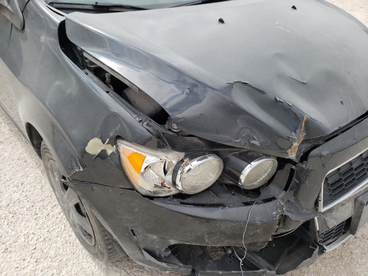Photo 9 from auction – 2014 CHEVROLET SONIC LS with VIN 1G1JB6SH7E4195320