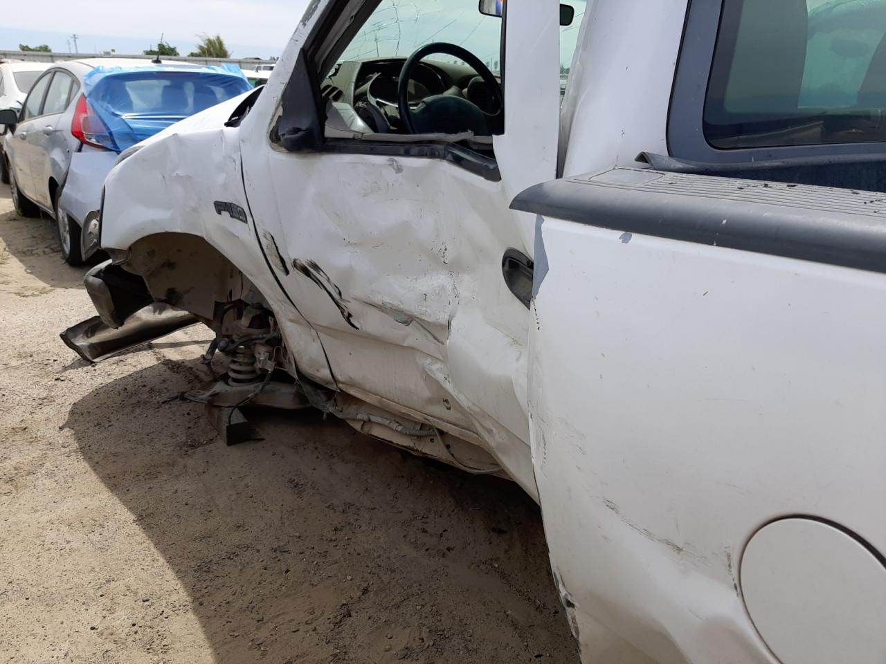 Photo 9 from auction – 1998 FORD F150 with VIN 1FTZF1726WKB46774