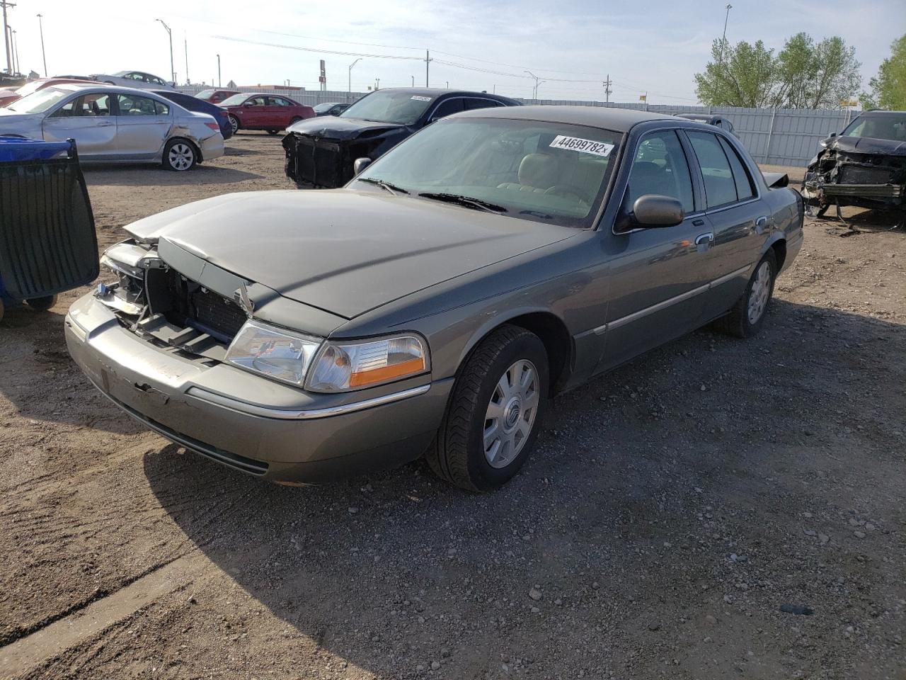 Photo 12 from auction – 2003 MERCURY GRAND MARQ with VIN 2MEFM75WX3X680904