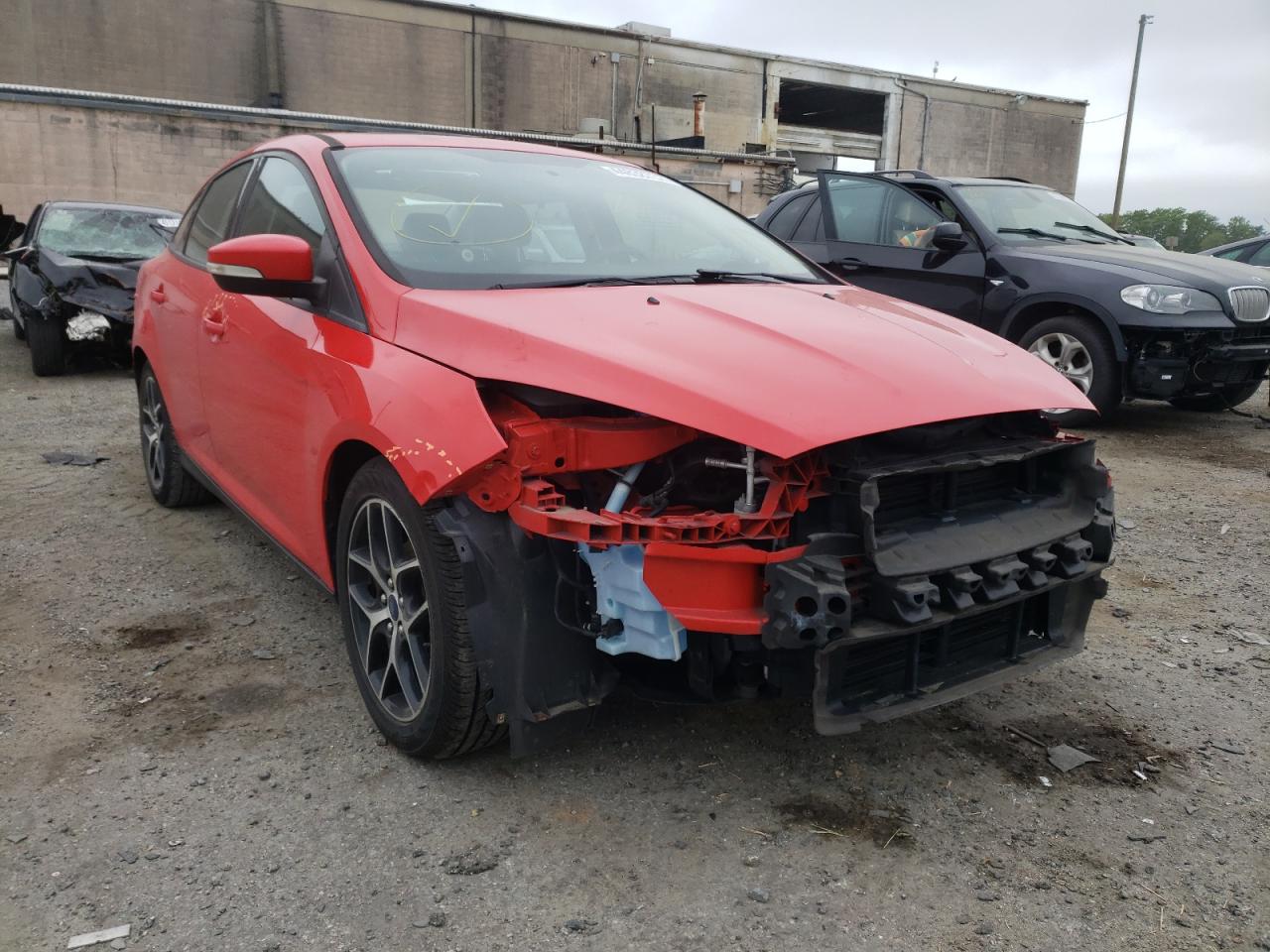 FORD FOCUS SEL 2017 with VIN 1FADP3H24HL212971 - Photo from auction