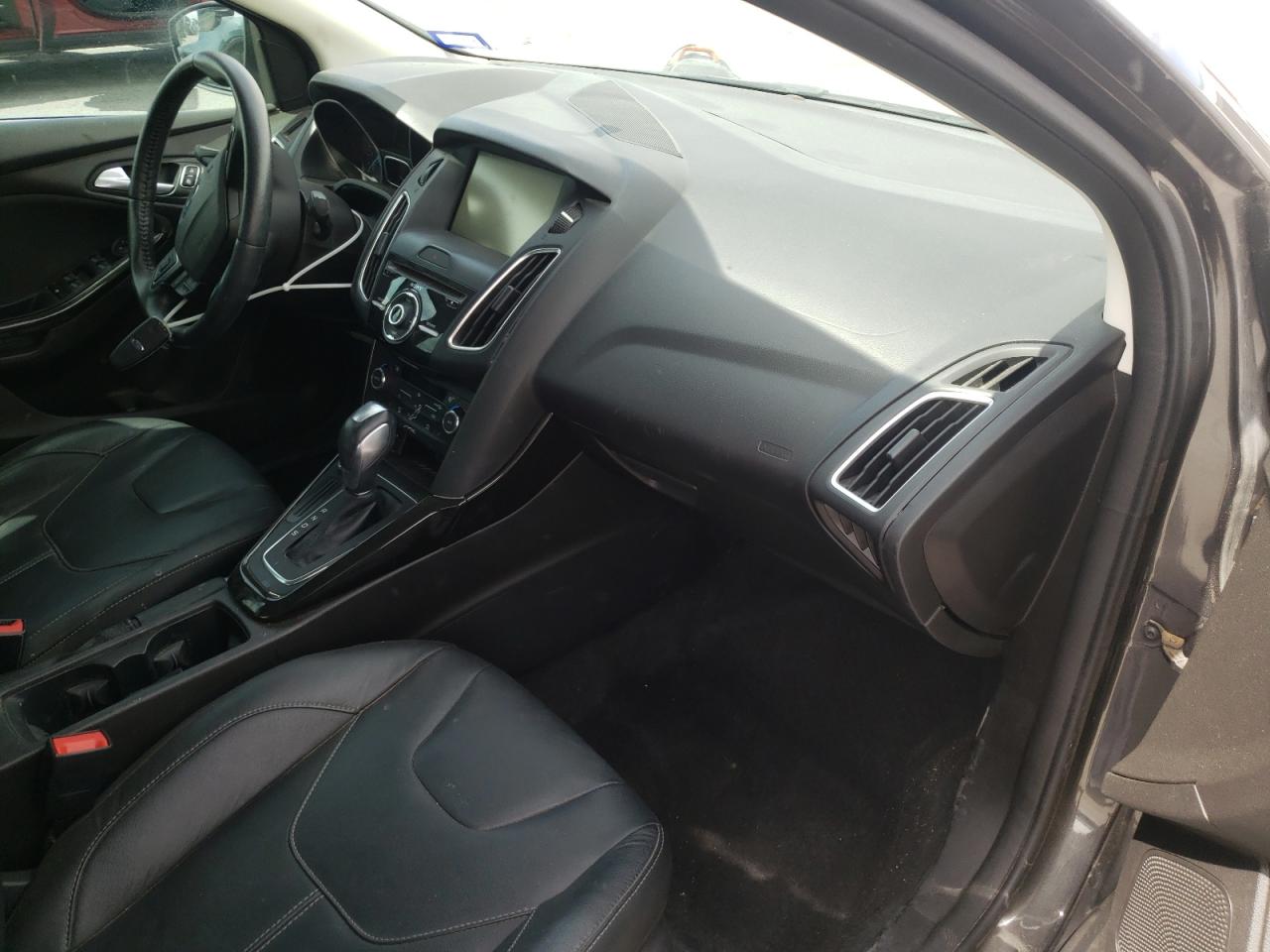 Photo 9 from auction – 2015 FORD FOCUS TITA with VIN 1FADP3J20FL358212