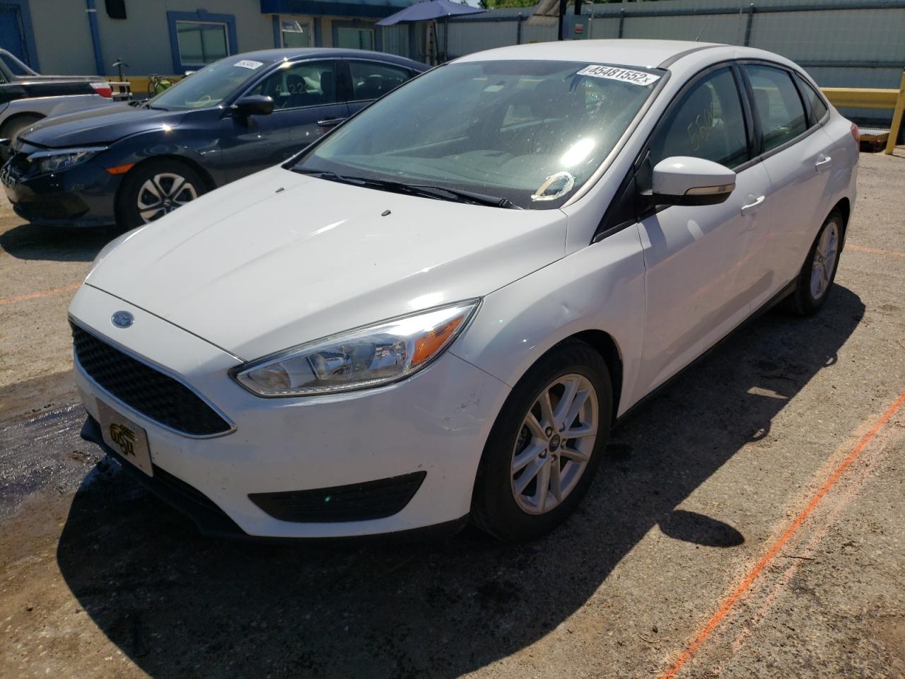 Photo 2 from auction – 2016 FORD FOCUS SE with VIN 1FADP3F29GL293564