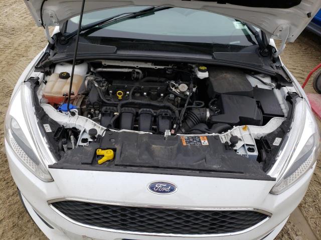 Photo 7 from auction – 2018 FORD FOCUS SE with VIN 1FADP3F20JL222101