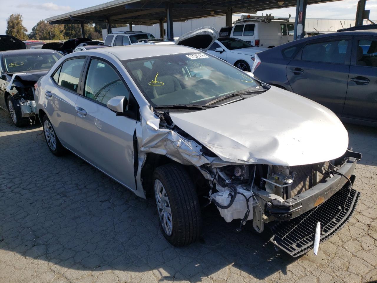 TOYOTA COROLLA L 2019 with VIN 5YFBURHE7KP932318 - Photo from auction