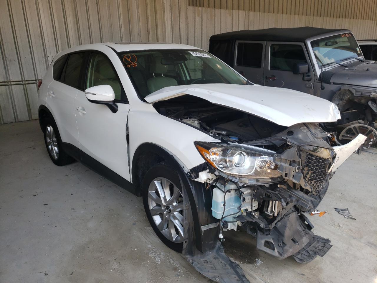 MAZDA CX-5 GT 2015 with VIN JM3KE2DY5F0544709 - Photo from auction