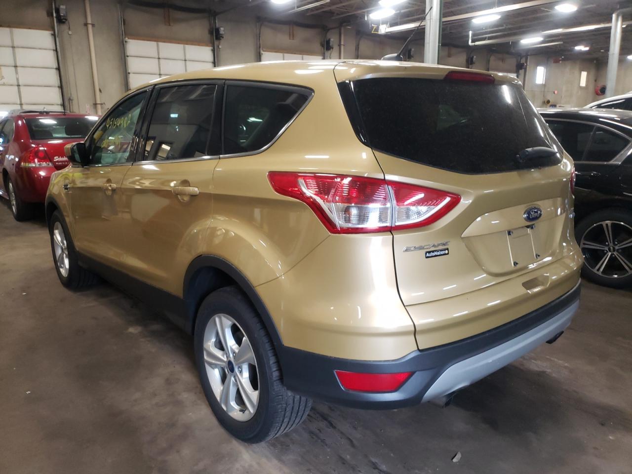Photo 3 from auction – 2014 FORD ESCAPE SE with VIN 1FMCU9GX0EUD01341