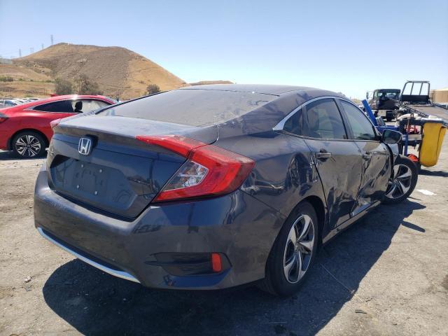 Photo 4 from auction – 2019 HONDA CIVIC LX with VIN 19XFC2F67KE207018