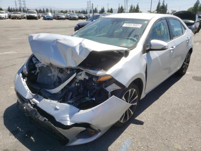 Photo 2 from auction – 2018 TOYOTA COROLLA L with VIN 5YFBURHEXJP808493