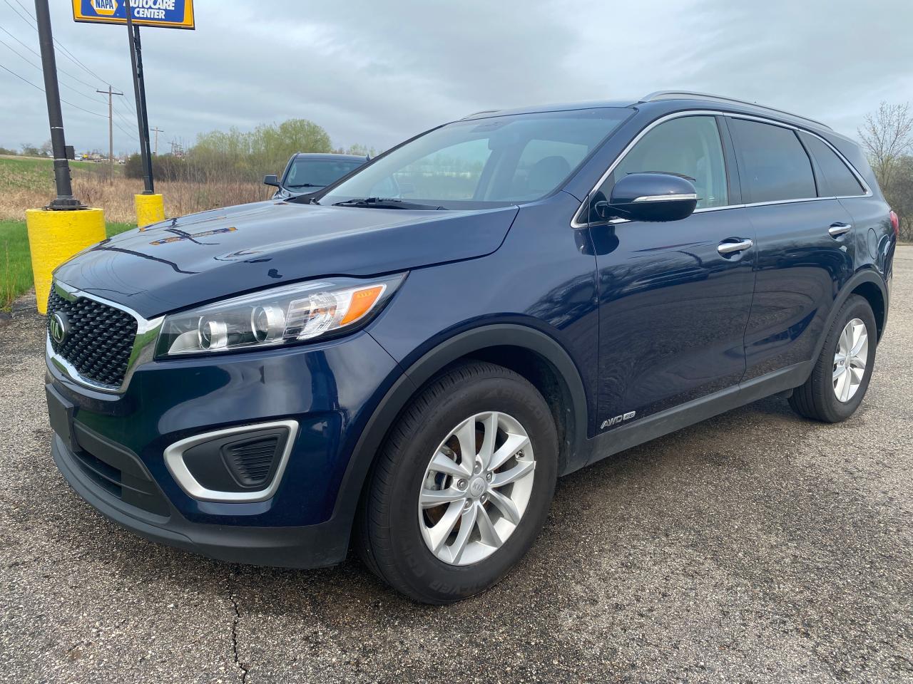 KIA SORENTO LX 2018 with VIN 5XYPGDA56JG420126 - Photo from auction