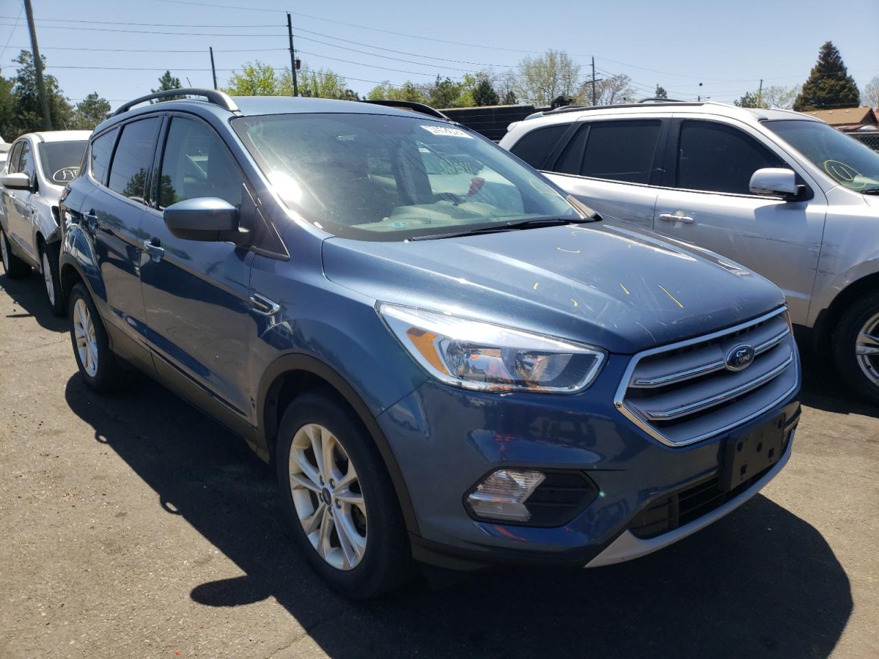 Photo 1 from auction – 2018 FORD ESCAPE SE with VIN 1FMCU9GD3JUC56623