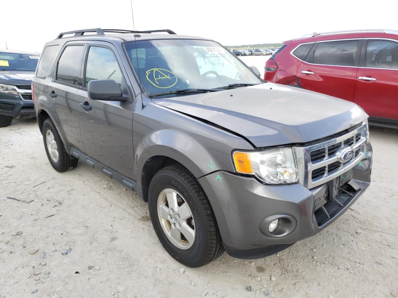 FORD ESCAPE XLT 2011 with VIN 1FMCU9DGXBKA49951 - Photo from auction