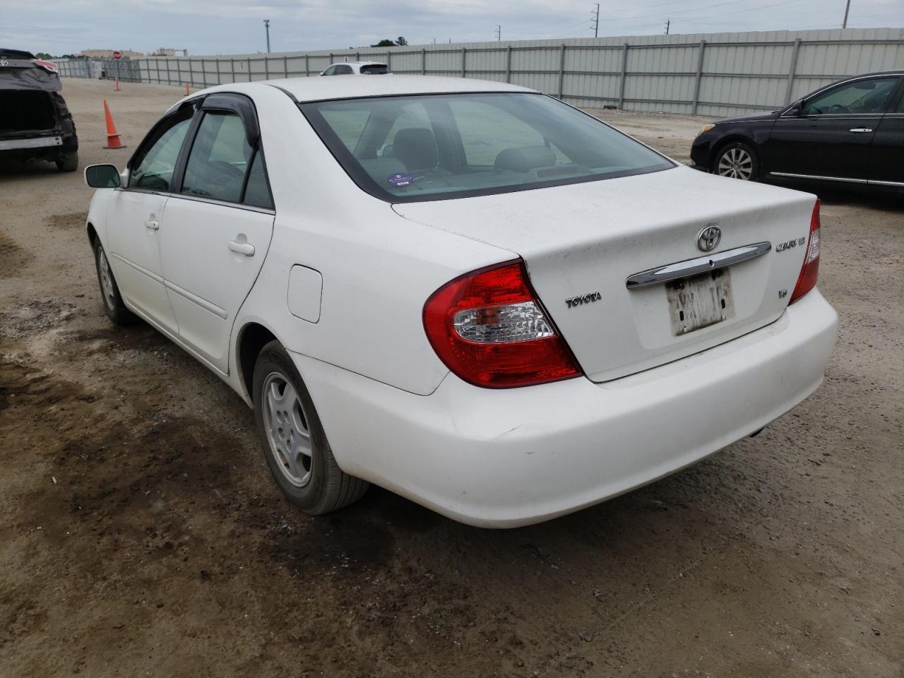 Photo 13 from auction – 2002 TOYOTA CAMRY LE with VIN 4T1BF32KX2U005205