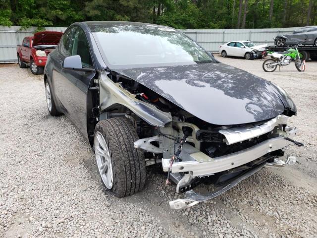 TESLA MODEL Y 2022 with VIN 7SAYGDEE7NF327887 - Photo from auction