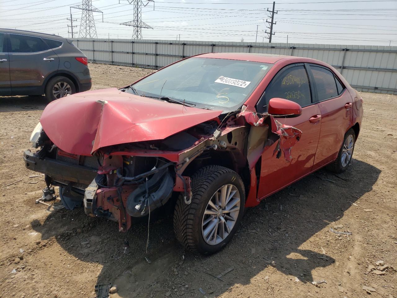 Photo 2 from auction – 2014 TOYOTA COROLLA L with VIN 5YFBURHEXEP058101