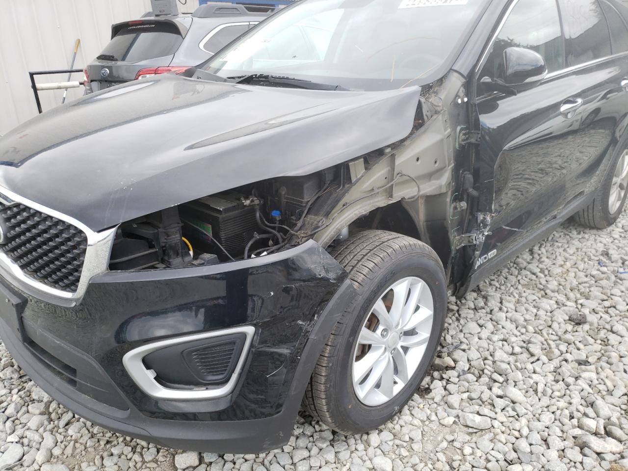Photo 9 from auction – 2016 KIA SORENTO LX with VIN 5XYPGDA51GG034562