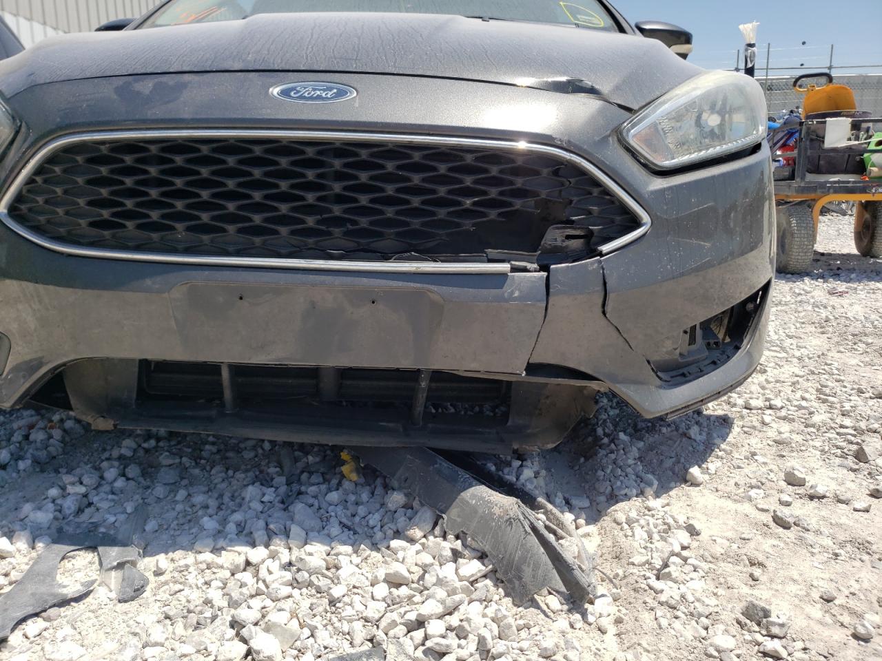 Photo 9 from auction – 2016 FORD FOCUS SE with VIN 1FADP3F24GL346316