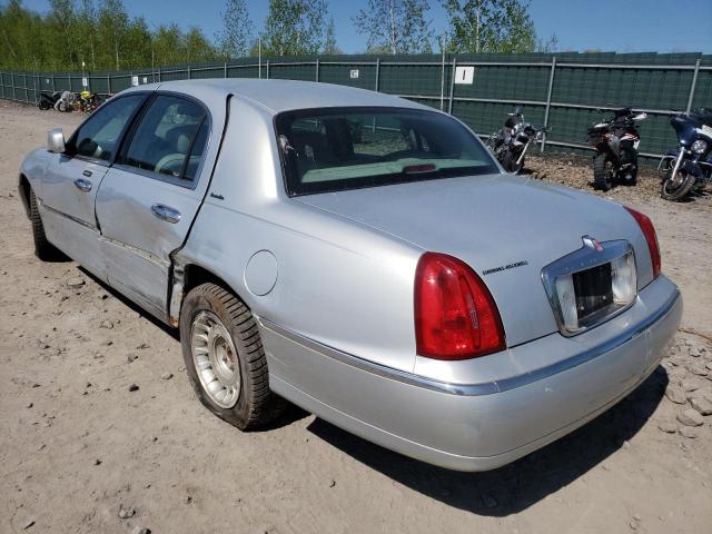 Photo 3 from auction – 2002 LINCOLN TOWN CAR E with VIN 1LNHM81W52Y628984