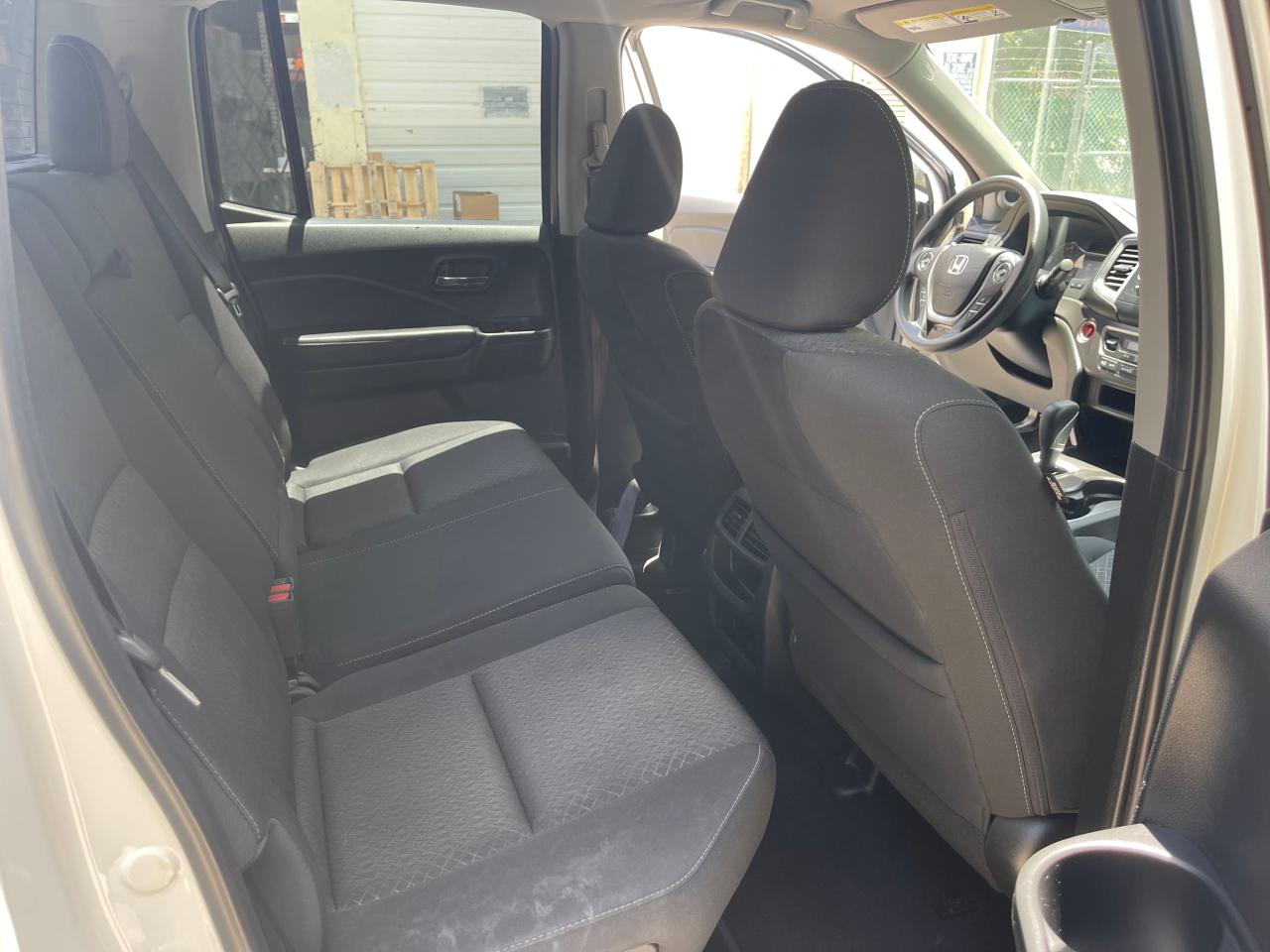 Photo 6 from auction – 2018 HONDA RIDGELINE with VIN 5FPYK3F17JB003888