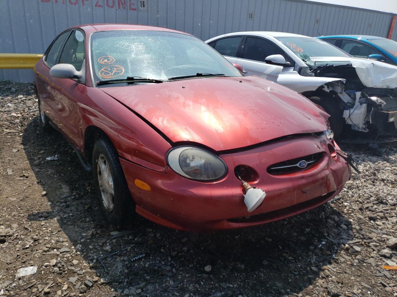 FORD TAURUS SE 1999 with VIN 1FAFP53U0XA311178 - Photo from auction