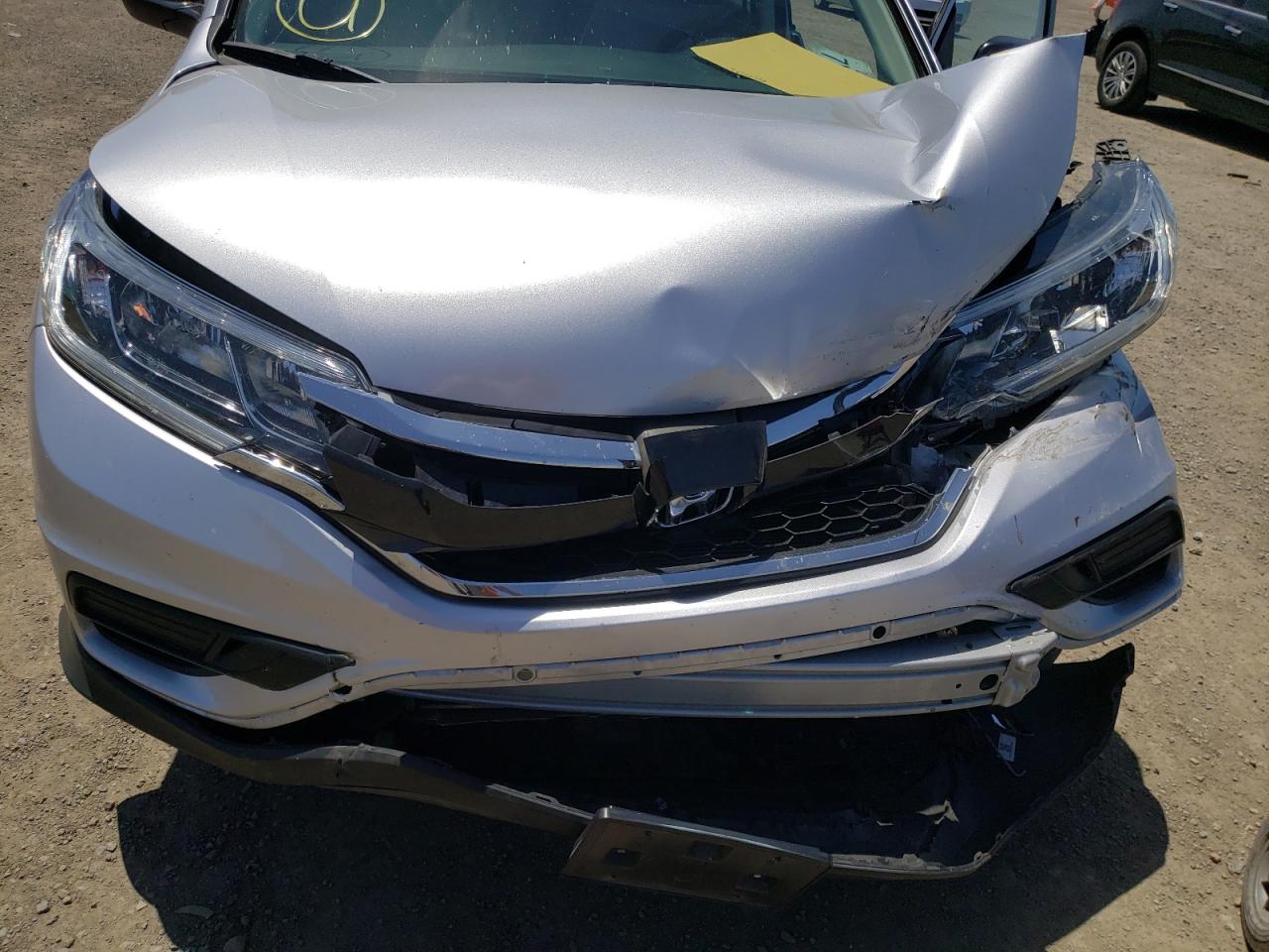 Photo 7 from auction – 2016 HONDA CR-V LX with VIN 2HKRM3H32GH569330