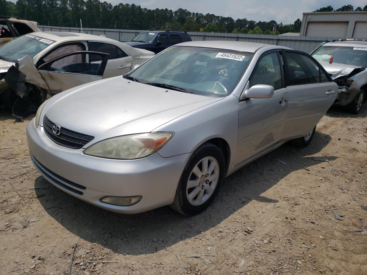 Photo 2 from auction – 2003 TOYOTA CAMRY LE with VIN 4T1BF30K93U543589