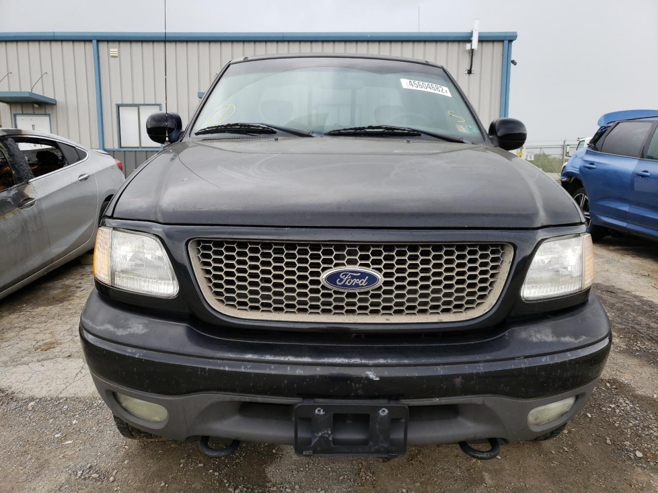 Photo 9 from auction – 2002 FORD F150 with VIN 1FTRX18W02NB67868