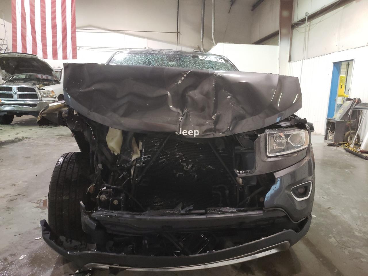 Photo 9 from auction – 2014 JEEP GRAND CHER with VIN 1C4RJFBGXEC135767