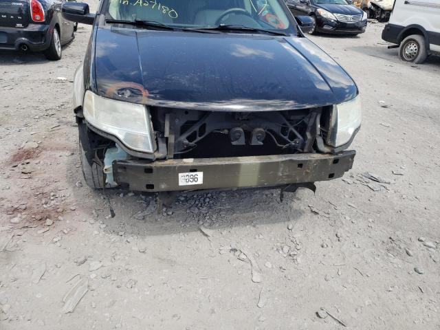 Photo 9 from auction – 2008 FORD TAURUS X E with VIN 1FMDK07W18GA27180