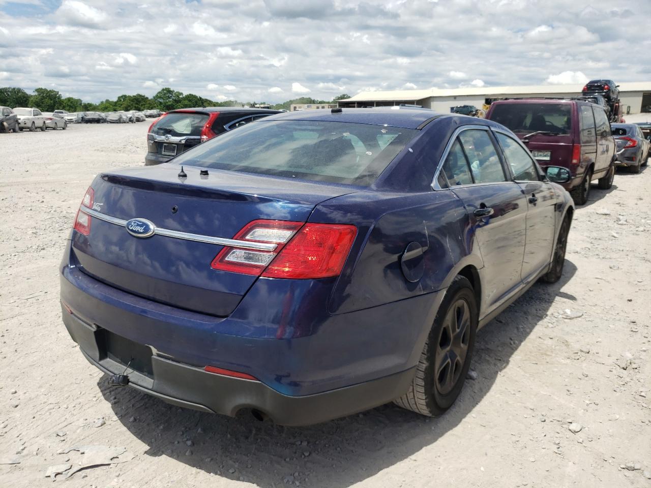 Photo 4 from auction – 2013 FORD TAURUS POL with VIN 1FAHP2M81DG121424