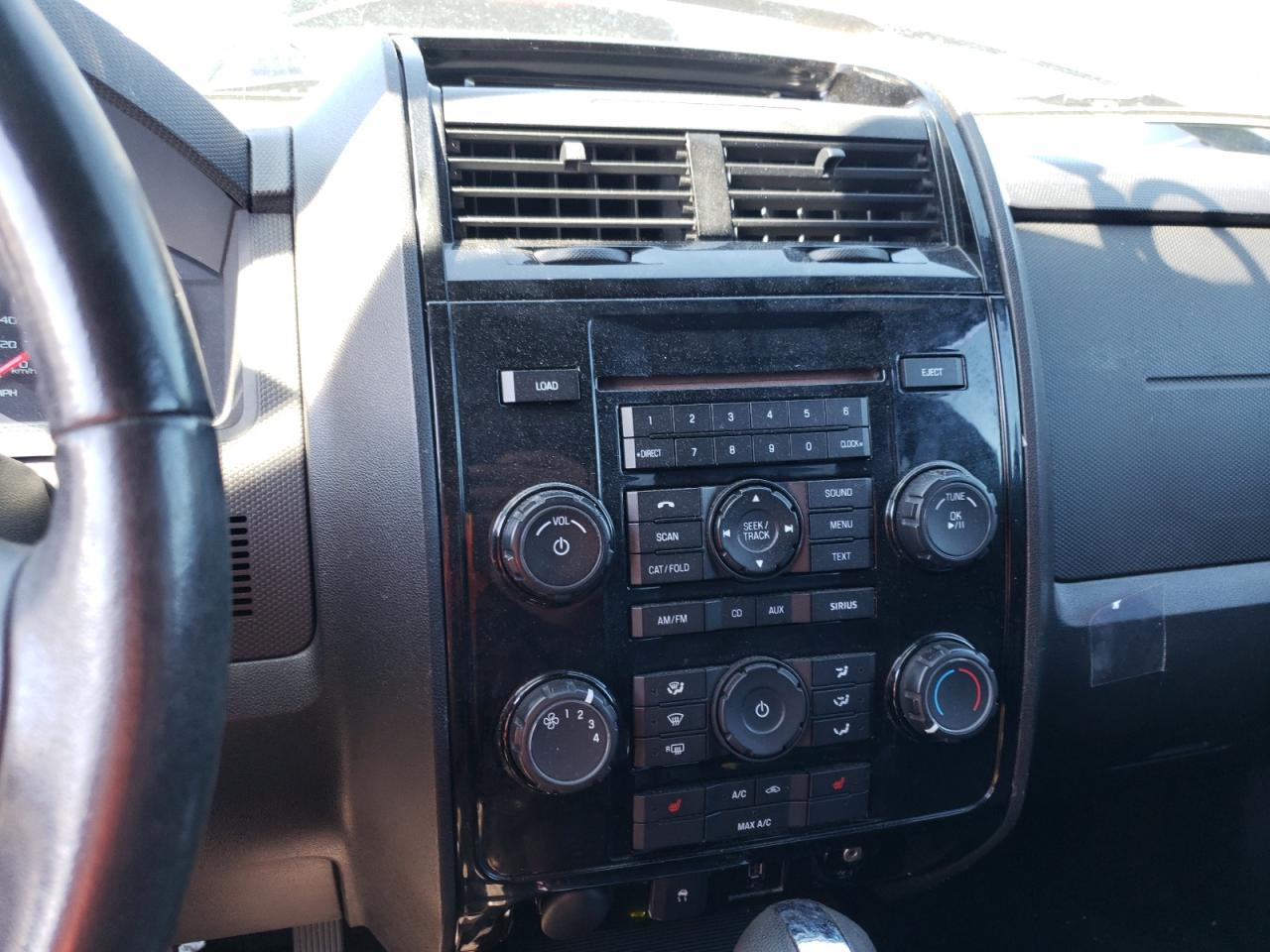 Photo 9 from auction – 2010 FORD ESCAPE LIM with VIN 1FMCU9EG0AKB42233