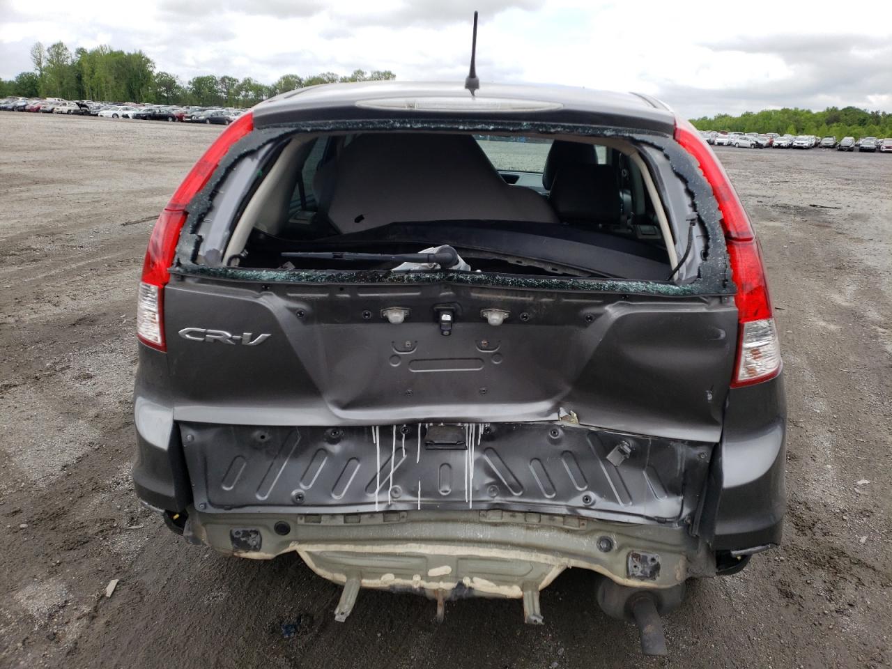 Photo 19 from auction – 2014 HONDA CRV with VIN 2HKRM3H31EH509729